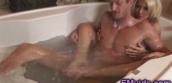  Stunning blonde plays with horny guy in the bathtub